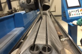 double track inside carbon laminate cut to open